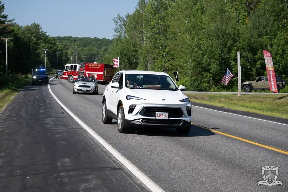 Riders roll through the route during the 2026 procession.