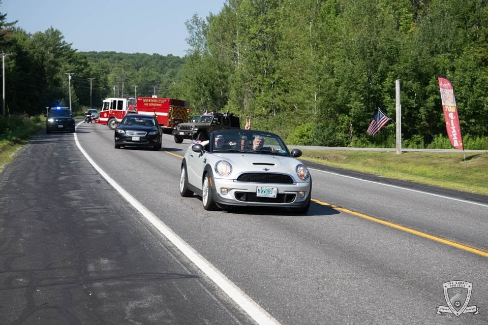 The procession makes its way along the 61-mile route honoring Andrew's memory.